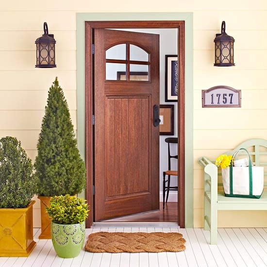 Container trees is a great addition even to a small porch.