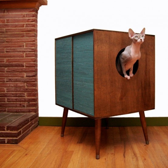 a dark stained box on legs with a cat litter box and an entrance will perfectly fit a mid-century modern space