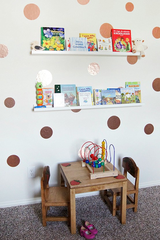 a playroom with ledges over the table with kids' books - this is a simple and cool idea to store books without using floor or table space