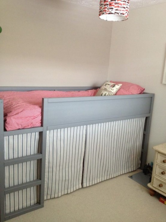 Light gray IKEA Kura bed with a secret