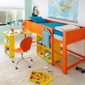 Bright orange IKEA Kura bed hack with a desk