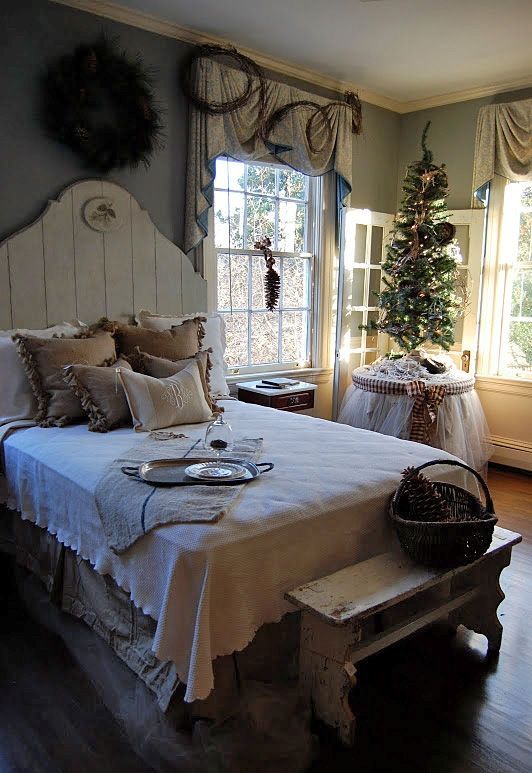 a Christmas tree, wreaths and pinecones in a basket will give your bedroom a storng holiday feel at once