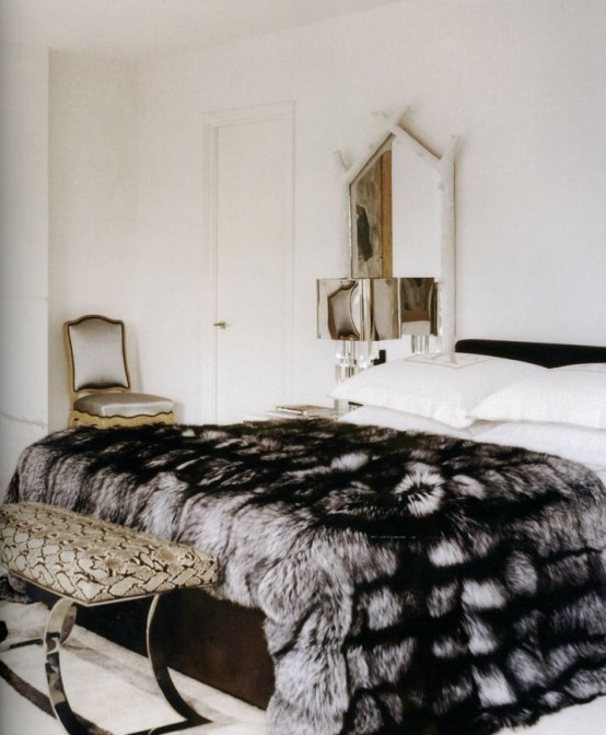 a lush faux fur blanket will add a refined touch and coziness to your bedroom and make it feel like winter