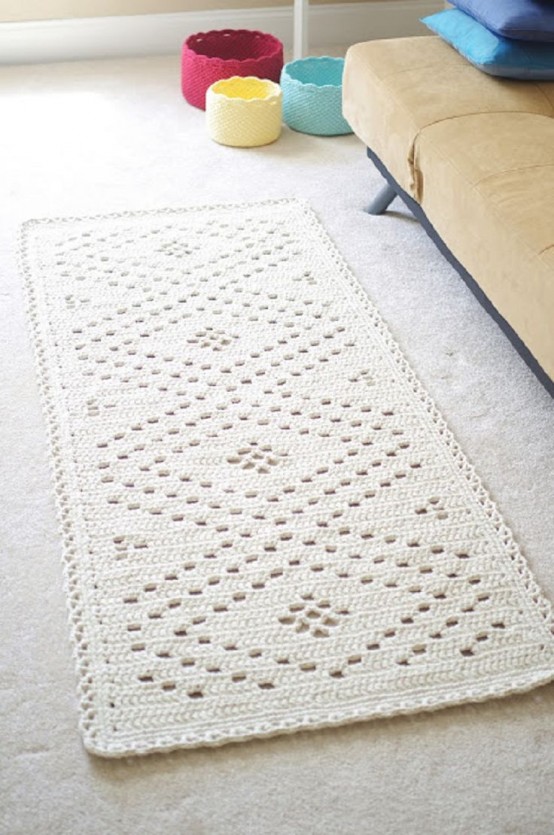 a crochet rug is a cool and lovely accessory you can DIY to personalize your space - add color and pattern to it