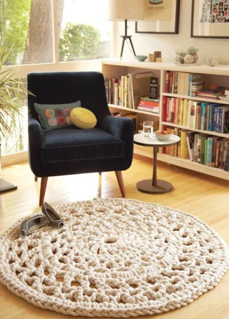 accent your reading space with a lovely grey crocheted rug to make this nook cozy and welcoming