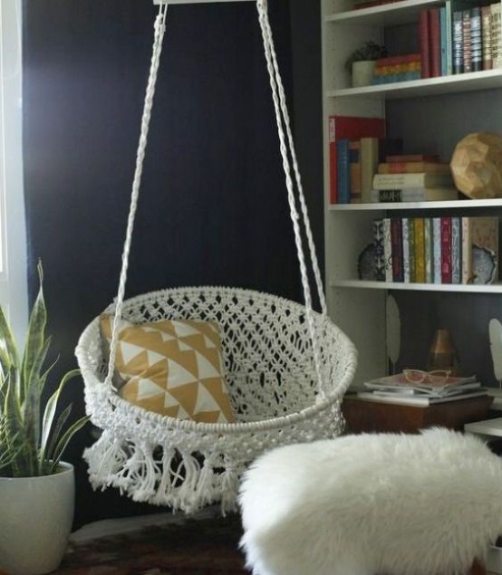 a beautiful hanging white crochet chair will effortlessly add a relaxed feel to yoru space and will make it more boho