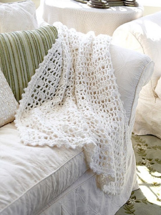 a neutral crocheted blanket is an airy and pretty thing that can be rocked not only in cold seasons but also on cold evening in spring and summer