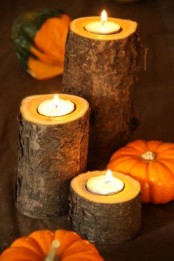 tree stumps with tealights on top for a rustic touch in the space and a strong woodland feel