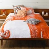 bright orange, grey and stained wood for a bold fall-inspired bedroom with plenty of pattern