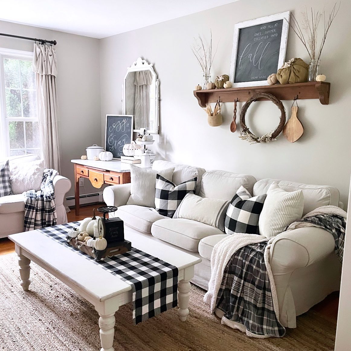 a curved orange sofa brings an autumn feeling to the space and makes it ultra-modern at the same time