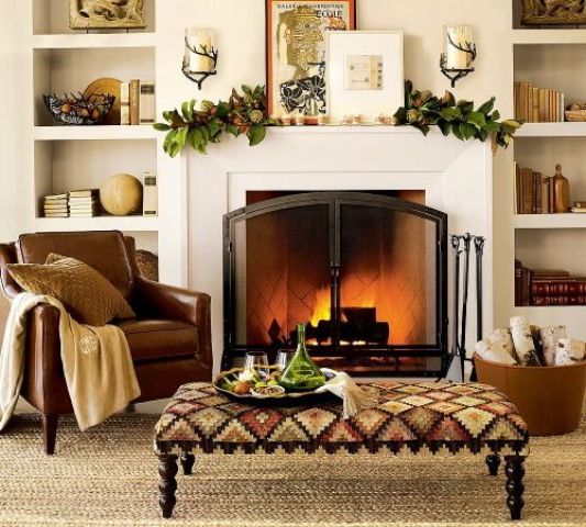 a fall-colored ottoman and a jute rug add cool fall aesthetics to the space