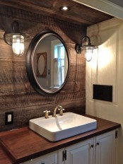 a bathroom with an amazing wood accent wall