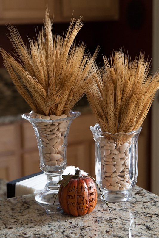 vintage glass vases with wheat and pebbles are gorgeous for centerpieces or just decorations in the fall