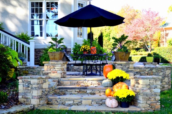 If you have steps to your patio, you can place several planters with Autumn flowers there.