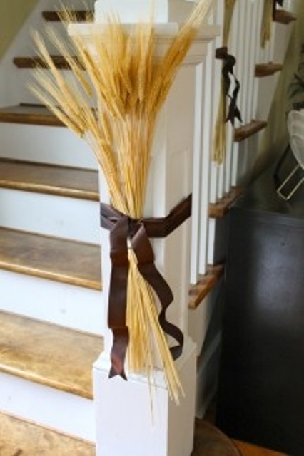 Ribbon is another great way to attach bouquets to balusters.