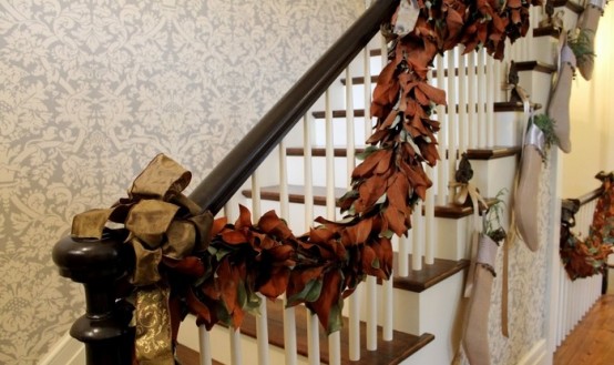 Cozy Fall Staircase Decor Ideas DIY garland of fallen leaves won't hurt your budget but would look great on staircase.