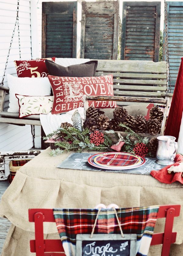 a plaid plate and a plaid blanket on the chair instantly give a holiday feel to the space, wherver you use them
