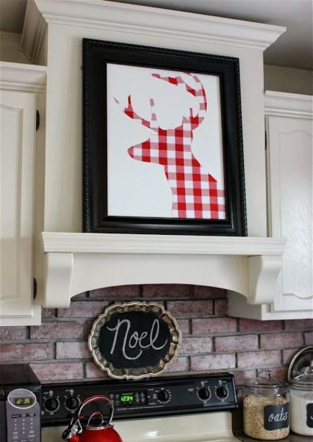 a pretty Christmas artwork - a red and white plaid deer silhouette - is very easy to DIY and it looks cool
