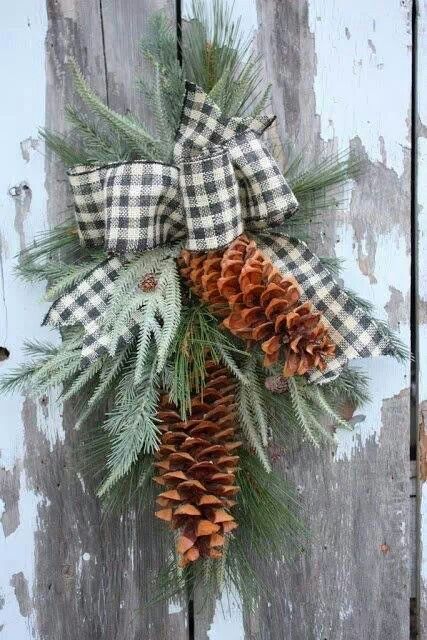 an evergreen and pinecone posie with a plaid bow can be used for traditional Christmas everywhere, and both indoors and outdoors