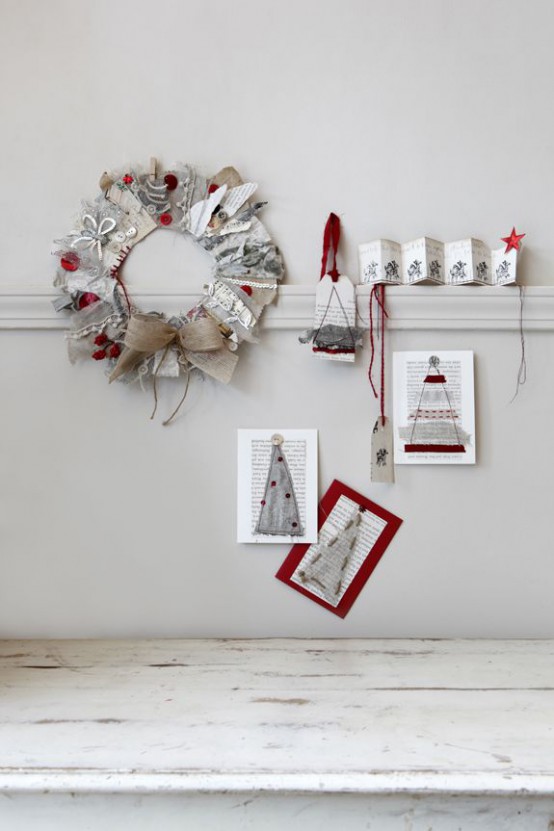 red and grey paper Christmas decor - a wreath, Christmas trees on paper and some pages with printing