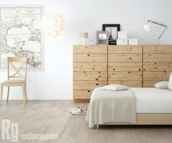 a Nordic bedroom with a wooden sideboard, an upholstered bed, a map, lamps and a chair