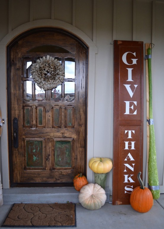 a Thanksgiving sign and some natural pumpkins make the porch inviting and won't take much time to decorate