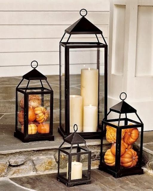 Cozy Thanksgiving Porch Decor Ideas Lanterns are great fall decorations. You can use them with candles but you can also stuff them with mini pumpkins.