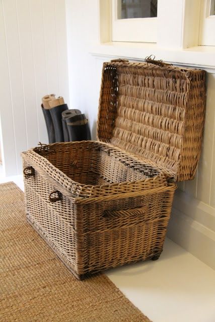 a wicker chest is a great piece for storage, it will give a rustic feel to your home and will make it more welcoming