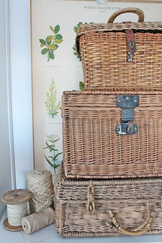 wicker suitcases and chests stacked are great for storing and to decorate your home at the same time adding a rustic feel to it