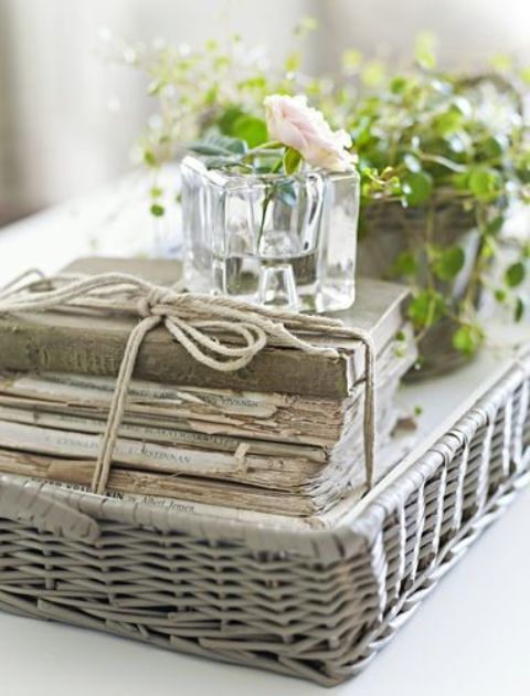 a wicker tray is a great idea to store and arrange things and to carry them as it has tall sides