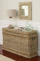 a tall and sleek wicker chest will be a nice idea for storage and an alternative to a console table in your entryway, it’s great for a beach or coastal space