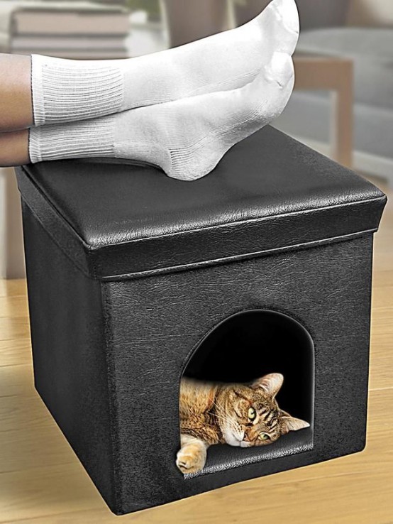 a black leather cube with a cat bed inside is a cool and modern idea with a stylish design and it will match many interiors