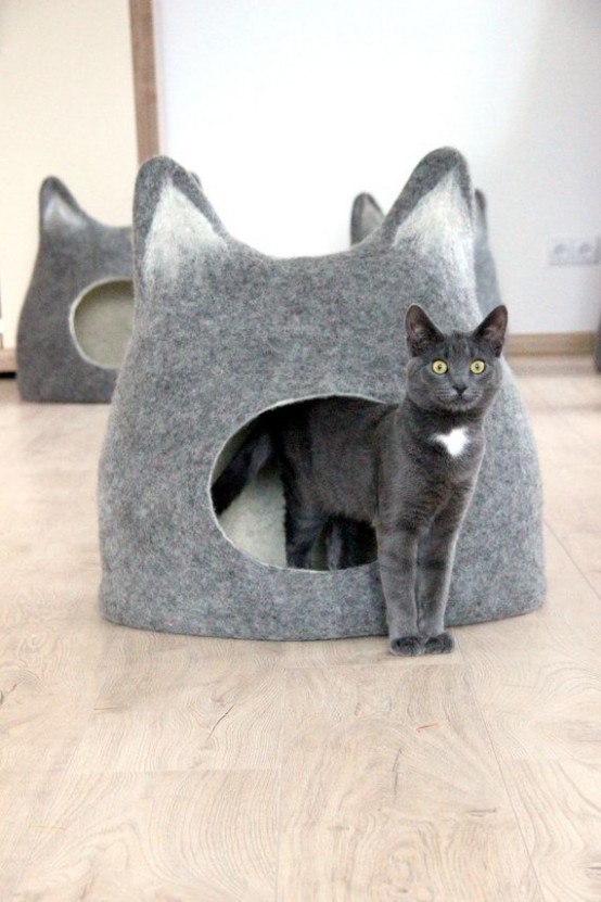 a fun felt cat house or cat bed shaped as a cat head is a creative idea for your interior and it makes your furry friend happy