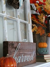 a relaxed dark stained fall sign will be a nice fit for your mantel and will add a rustic feel to the space