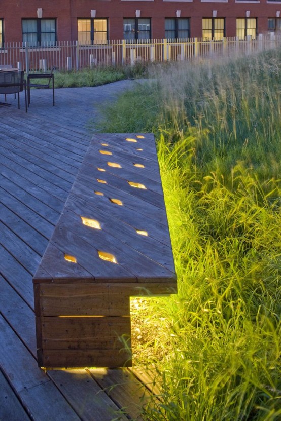 a reclaimed wooden bench with cutouts is a lovely idea to illuminate the space, you won't have to sacrifice any ground space for lamps