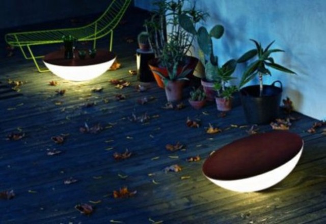 bowl shaped lamps giving lunar shaped light to an outdoor space are amazing to illuminate it in a gentle and modern way