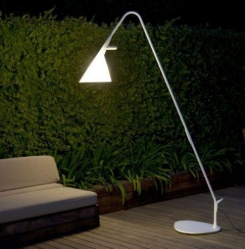 a modern and sleek white floor lamp reminding traditional indoor floor lamps is a great idea for a modern space