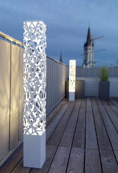 white pillar cutout outdoor lamps are a modern idea with a bit of edge, they provide your space with a lot of light taking just some floor space