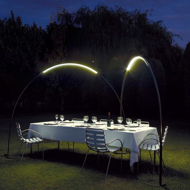 veyr creative and sleek arch outdoor lights can be placed over a dining zone or a sitting one, and they will give just subtle light