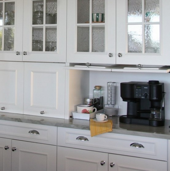a mini coffee station with a coffee machine, cups and mugs and sugar hidden in a rustic cabinet is an elegant option