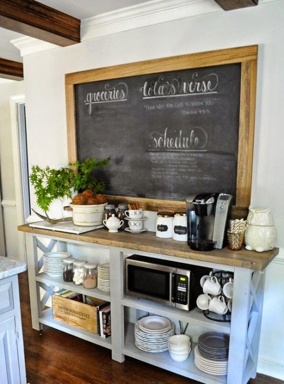 a chalkboard in a frame over a coffee station is a nice idea for a farmhouse space like this kitchen