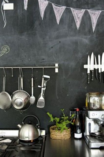 a chalkboard backsplash with railings, holders and chalkboard decor is a very modern and very simple solution to rock