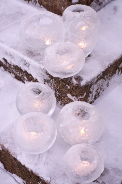 an arrangement of ice sphere luminaries will illuminate your steps and will make entering the house really magical