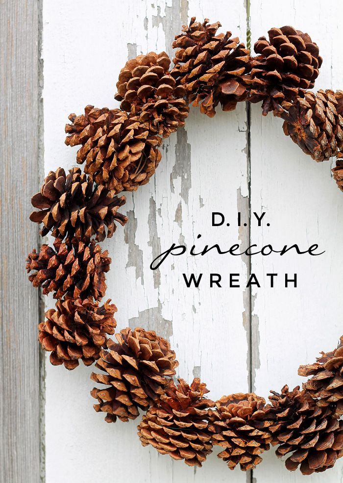 a simple pinecone wreath can be used both in the fall and winter to decorate your front door in with a woodland feel