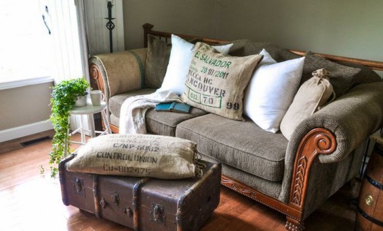 a vintage suitcase substituting a coffee table with storage - just place your piece on some casters or legs and voila