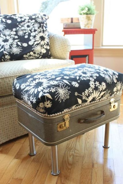 a pretty footrest of a pouf of a vintage suitcase on legs and a large cushion or pillow on top is a cool solution for a vintage space