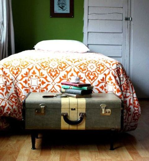 skip a storage bench and use a vintage suitcase placing it on legs to get a lovely storage bench for your bedroom and upcycle an old piece at the same time