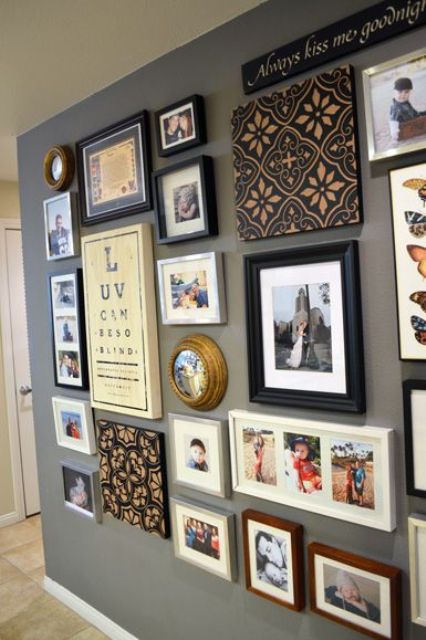 a large gallery wall with colorful photos and artworks in mismatching frames is a creative idea with fun decor