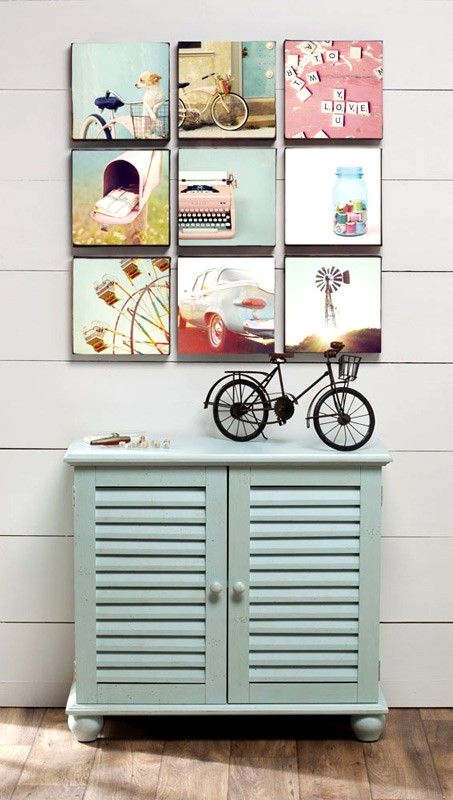 a stylish gallery wall with cool photos on cubes attached to the wall with no frames is a cool idea