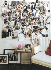 a memoboard with lots of photos chaotically attached to it is a very bright eclectic decoration for any space